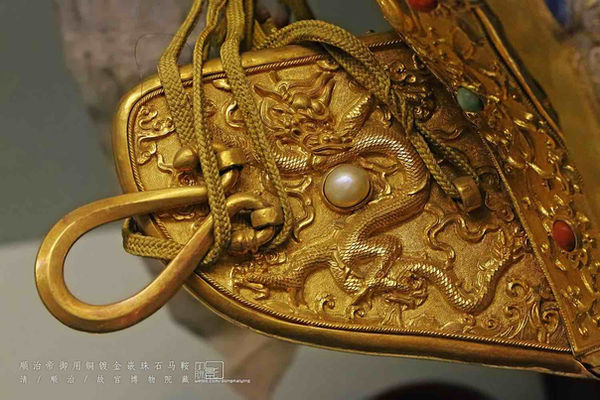 Gold Saddle of Shunzhi Emperor that Decorated with Dragon Patterns and Gems